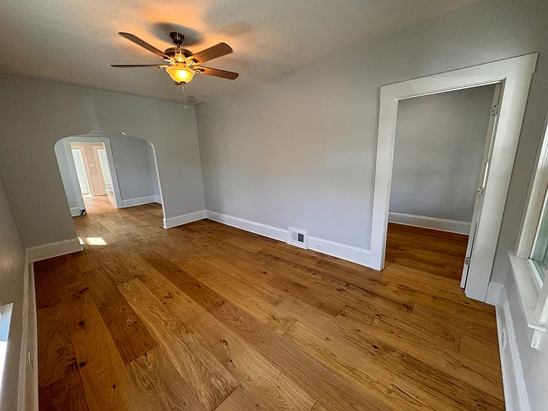 Living room with entrance to bedroom #3 (the smaller of the 3)