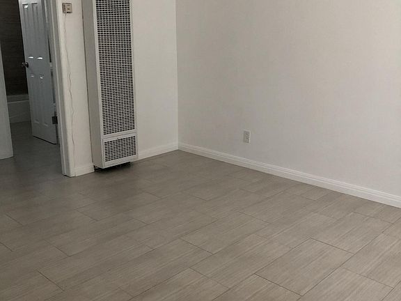 Livingroom with new porcelain tiles subway pattern