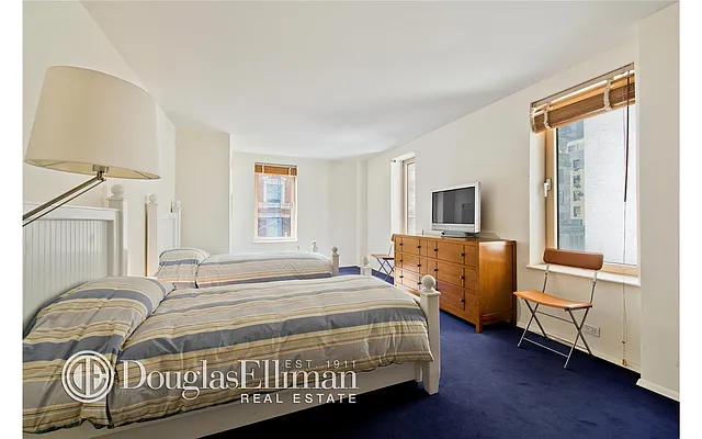 Sold by Douglas Elliman | media 18