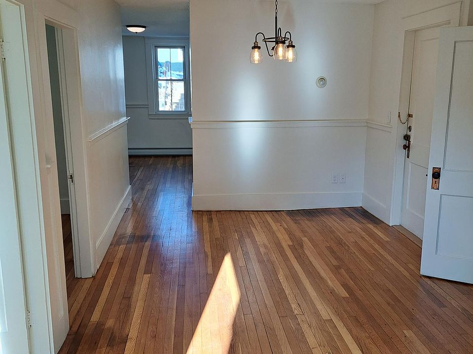 Entry looking through to front. Open Concept: Kitchen, bath to right. 2 bedrooms to left. Large front living room.