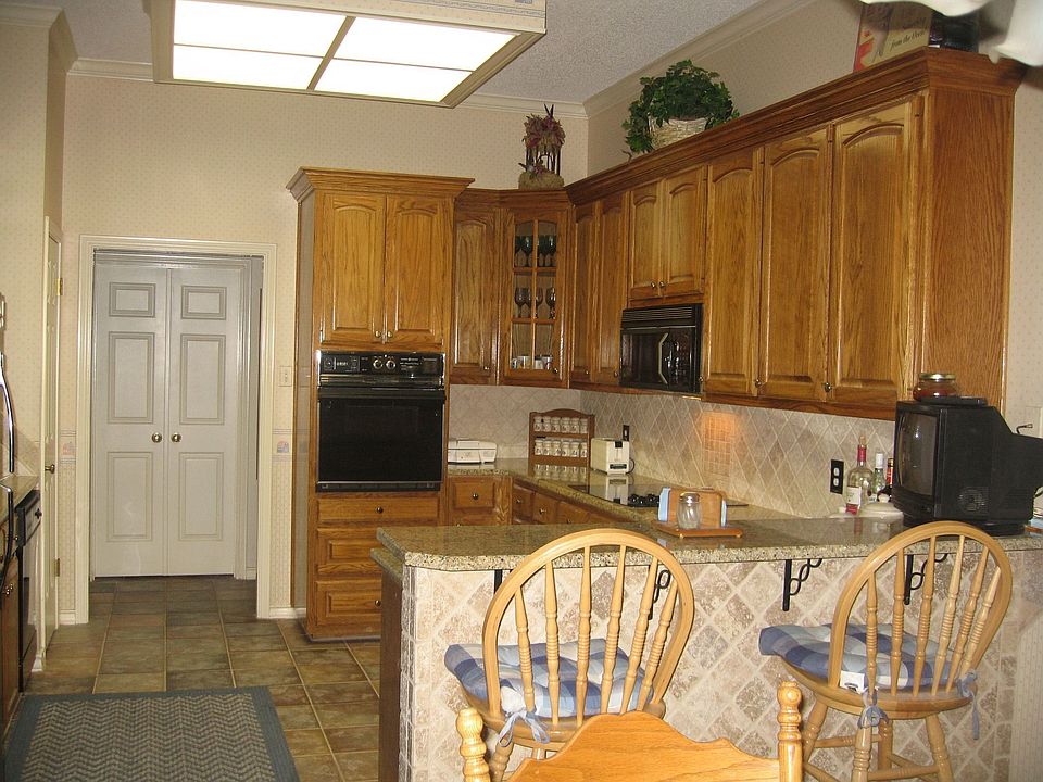 Recently updated kitchen with granite countertops and tile flooring