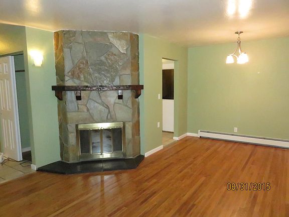 Living room with fireplace.