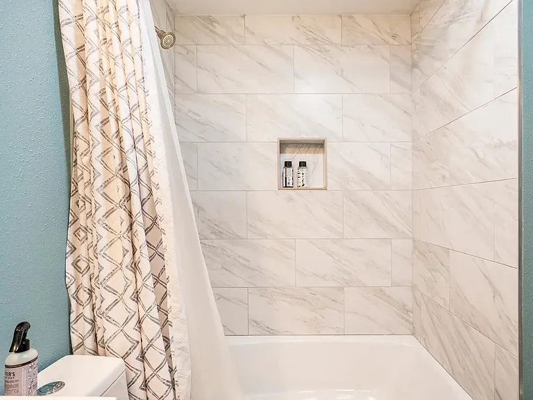 Spacious shower in basement bedroom