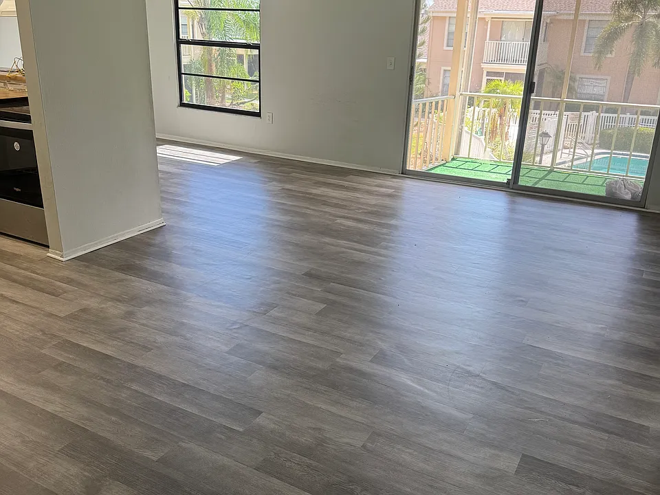 Primary living space. Brand new flooring.