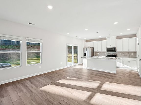 The great room offers an abundance of natural light.