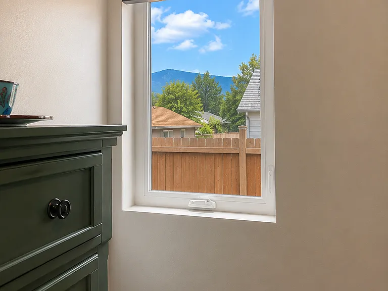 Tall heavy cedar dresser and view of the Pikes Peak mountain range