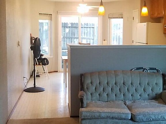 New Laminated Wood floor being installed in living room prio