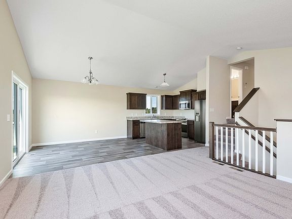 Make lasting memories in the spacious and open entertaining areas of this split-level home