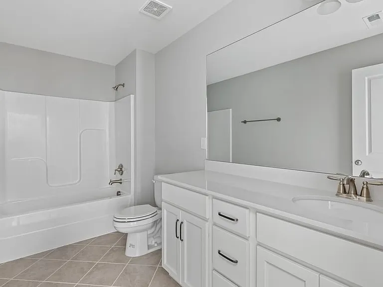 Full bathroom off of bonus area upstairs
