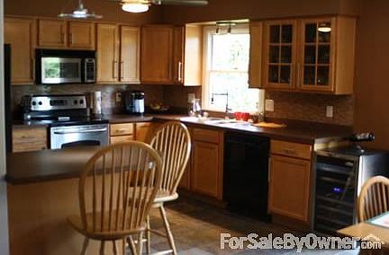 Kitchen w/ Appliances except Wine Fridge
						:
						New Cabinets, Slate Floors, Glass Tile Backsplash
