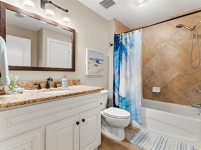 6420 Sunset Bay Cir — Photo 43