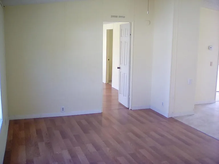 New Wood Flooring in Living Room (looking into master bedroo