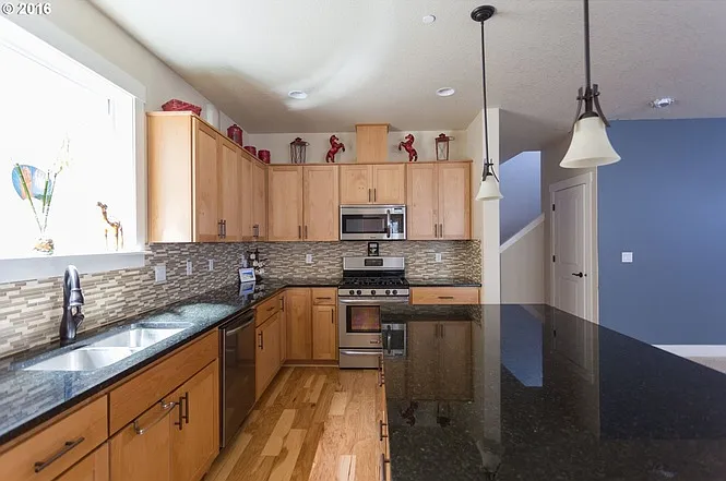 7697 NE Prefontaine St — Photo 10