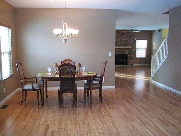 Formal Dining Room Is Highlighted By Maple Floors