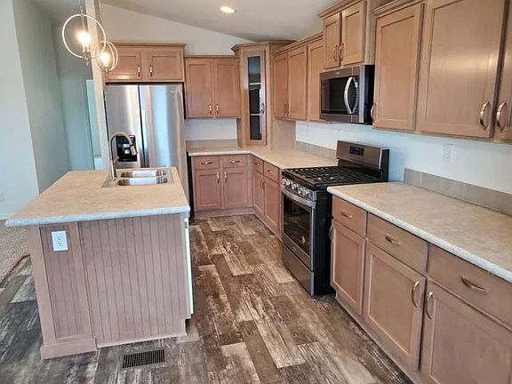 Spacious Kitchen that looks on to living room