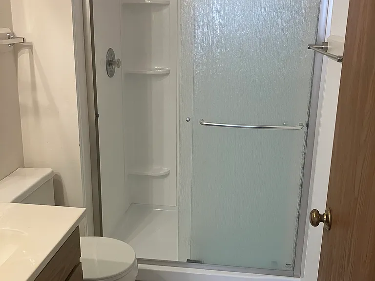 Master bath with newer shower surround.