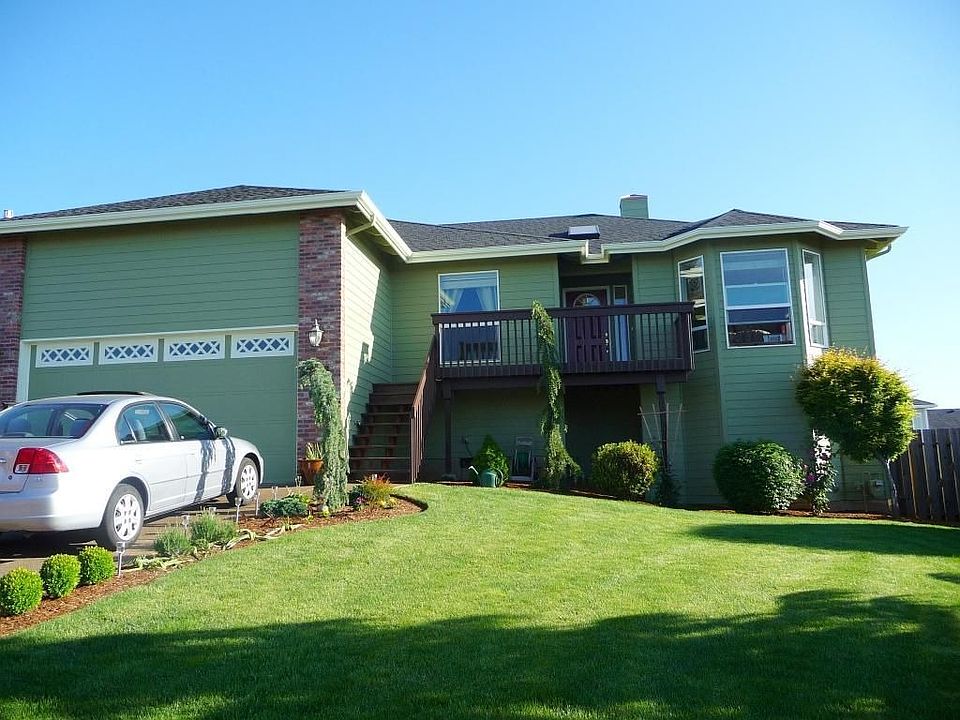 Front of house, 2 car garage