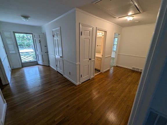 View from the Living Room into the main entrance and hallway.
