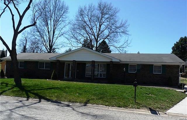 Full brick exterior with vinyl trim.  Rear entry 31x23 heated & insulated garage with extra carport & large drive.