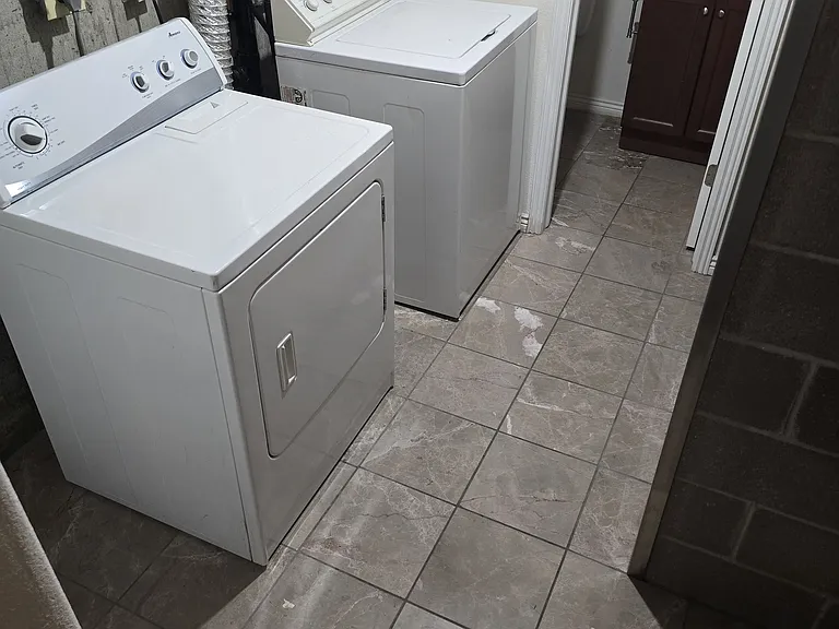 Basement Washer & Dryer Area