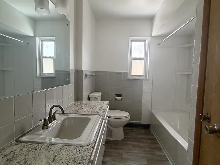 Bathroom with new shower and flooring