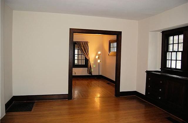 14x13 formal dining room with beautiful built-ins and hardwoods.