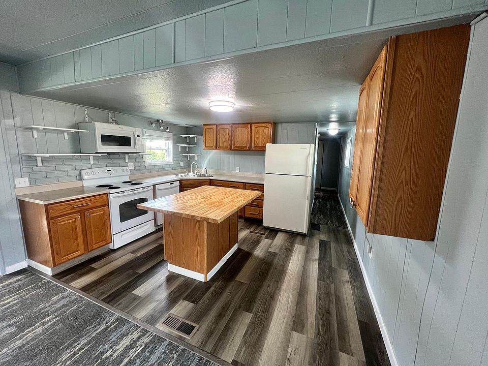 kitchen with butcher block bar seating