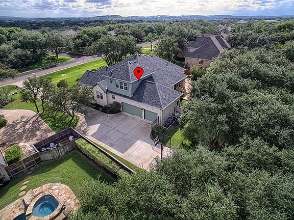 Home sits on more than half an acre with mature trees and beautiful landscaping!