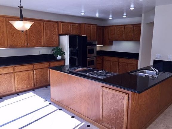 Granite counter top with lots of storage space!
