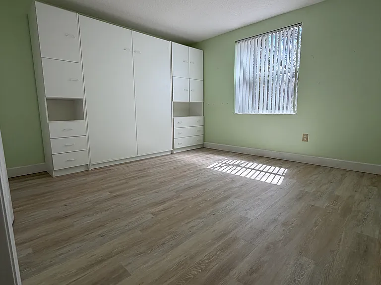 Guest Room #3 with Queen size Murphy bed, cabinets and oversized closet