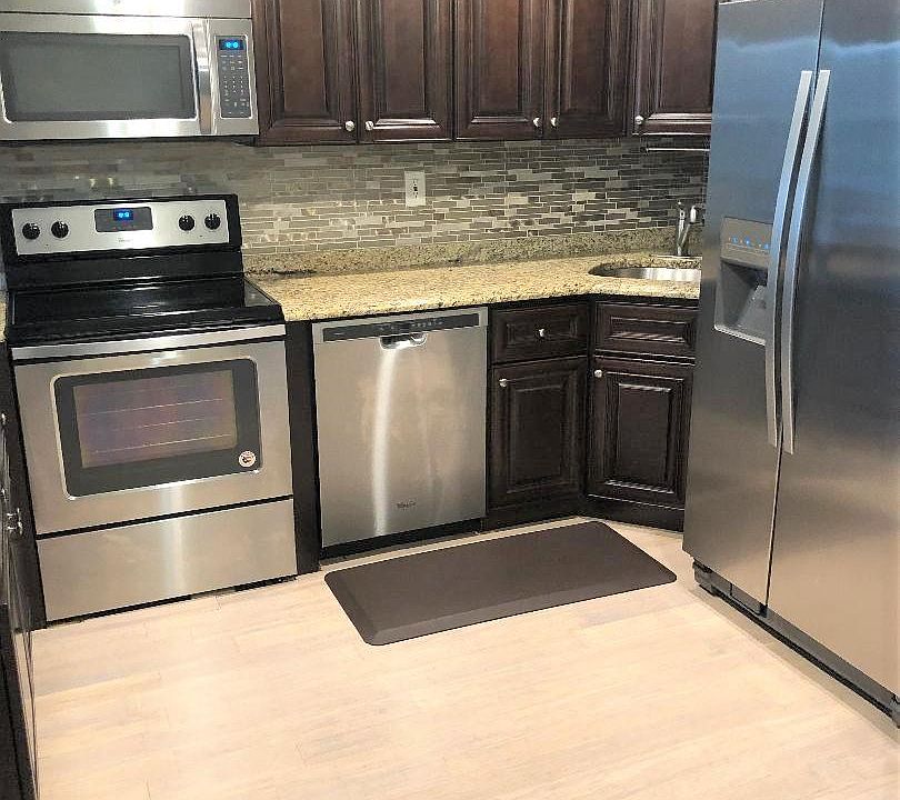 STAINLESS STEEL APPLIANCES - REFRIGERATOR, STOVE, DISHWASHER & MICROWAVE