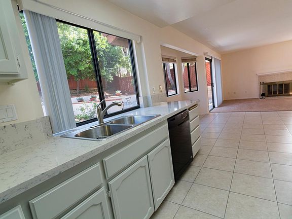 New quartz countertops in kitchen (new appliances not pictur