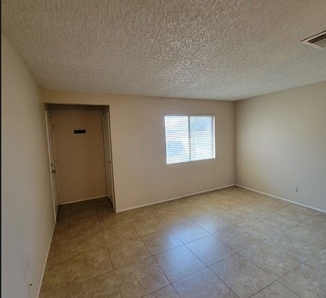 ample gathering room with beautiful 20 inch floor tiles