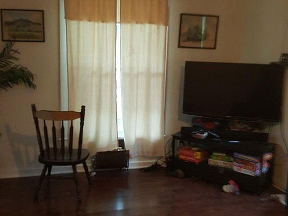 The living room and dining room are an open space (no wall between them)