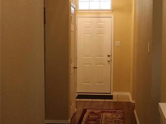 Hallway to Rooms/Laundry