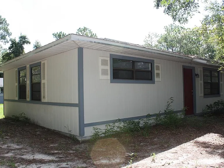 7965 W Fern Pl — Photo 1