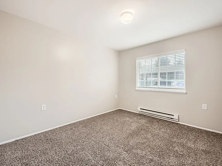 Second bedroom in a two-bedroom two-bath apartment at Capitol City in Lacey, WA