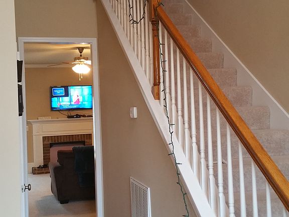 Entry hall staircase to second floor family room