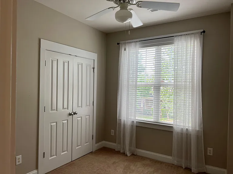 Another extra bedroom to front of home. Light and airy.