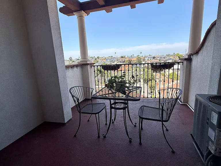 Large patio with a shade area, sun area, and wonderful view.