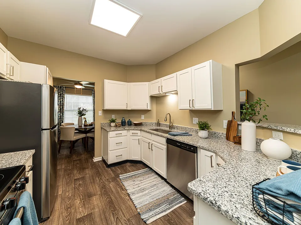 Kitchen with granite counters and modern cabinetry