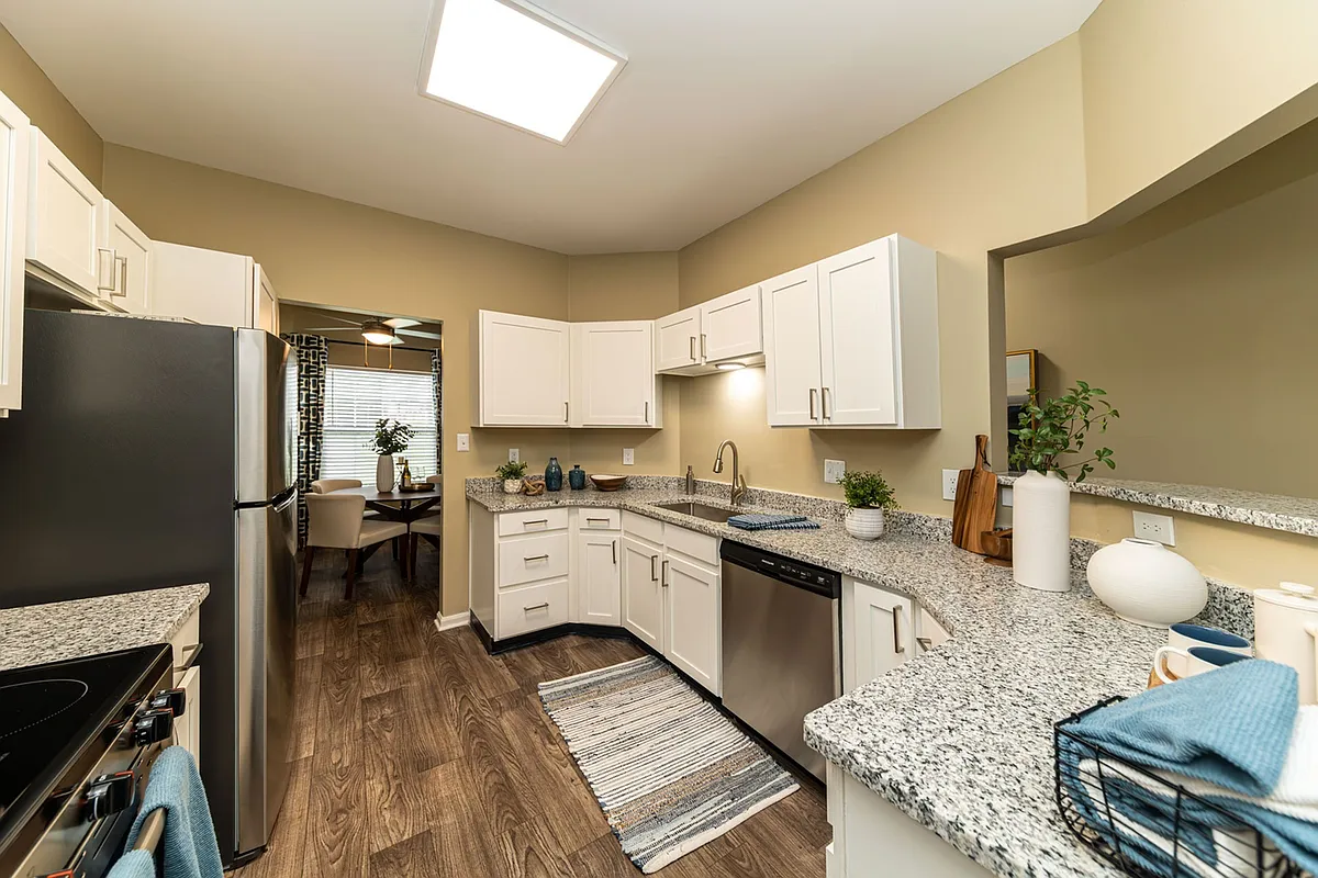 Kitchen with granite counters and modern cabinetry - Cooper Creek