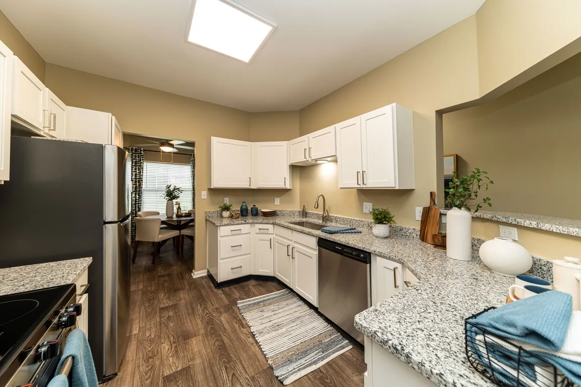 Kitchen with granite counters and modern cabinetry