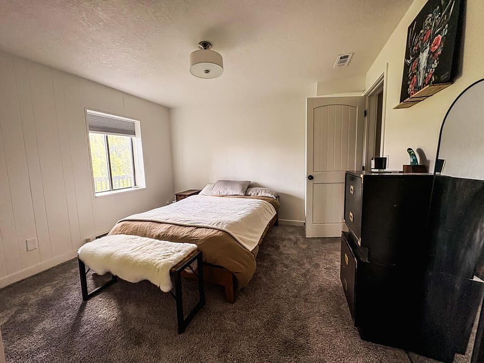 Door from main bedroom leads to living room & second bedroom.