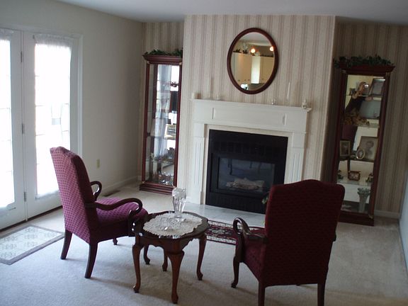 Fireplace off Kitchen Area