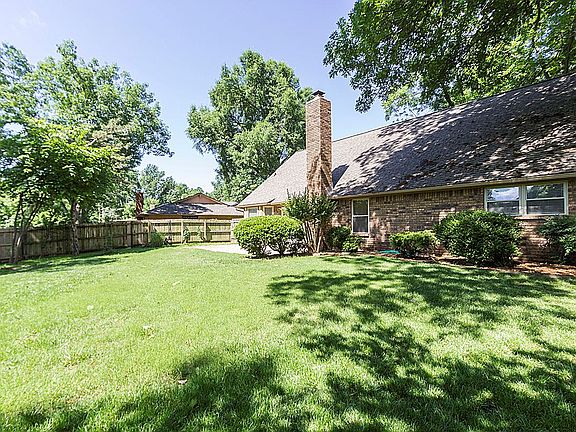 Backyard is ready for future play area.