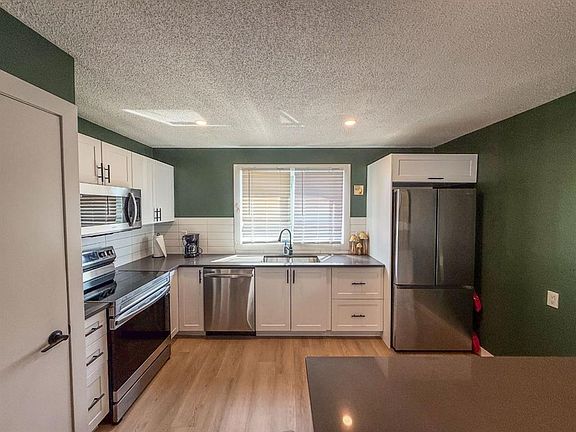 2nd image of 119 S Fallswater Cres NE