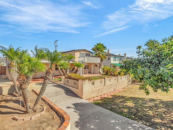 View from Lower Level of Backyard Back Towards Upper Level & House
