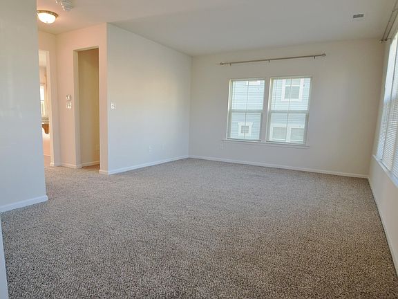 MINI BLINDS AND CURTAIN RODS ARE INSTALLED ON ALL WINDOWS THROUGH OUT THE HOME