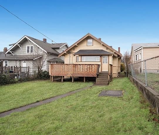 Backyard with deck and grass area